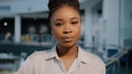 Close-up serious pensive sad business woman portrait. Headshot African American girl biracial female entrepreneur