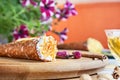 Close up on served cannoli with orange. Italian cuisine pastry. traditional italian dessert with ricotta cheese. Selective focus. Royalty Free Stock Photo