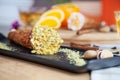 Close up on served cannoli with orange. Italian cuisine pastry. traditional italian dessert with ricotta cheese. Selective focus. Royalty Free Stock Photo