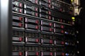 Close up server rack cluster in a data center selected focus, narrow depth field Royalty Free Stock Photo