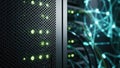 Close-up of server rack with glowing green lights and blurred network cables Royalty Free Stock Photo