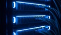 Server Room Data Center Network Servers and Cables in Blue Royalty Free Stock Photo