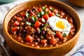 Close-up of a serving of vegan chili in a rustic clay bowl, accompanied by a side of cornbread. AI generated. Royalty Free Stock Photo