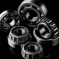 Close-up of a set of ball and roller bearings on a dark background