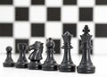 Black chess pieces on chessboard, Set of chess figures on white background Royalty Free Stock Photo