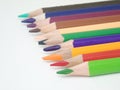 Close-up set of colored pencils isolated on white isolate.