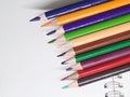 Close-up set of colored pencils on white isolate.