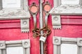 Abandoned Red Church Doors with Chain and Lock