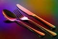 Luxurious golden cutlery set on abstract background Royalty Free Stock Photo