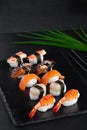 Close-up set of nigiri sushi with fresh shrimp, salmon, scallop, smoked eel Royalty Free Stock Photo