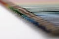 Set of pencils perfectly arranged in line on white surface for childs art Royalty Free Stock Photo