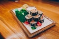 Close-up Set Philly philadelphia eel smoked philadelphia Red Green dragon California ,Ebi-Maki Roll Rainbow ginger seaweed in nigh Royalty Free Stock Photo