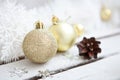 Close up of several Christmas gold glass baubles