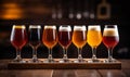 Close Up of several glasses of different types of draft beer in a pub.