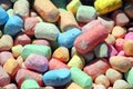 Close up of several pieces of multi colored colourful chalk, red