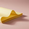 Close-up of several sheets of light yellow paper folded over each other, creating a gent Royalty Free Stock Photo