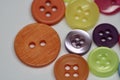 Close up of Sewing Buttons on White Background Royalty Free Stock Photo