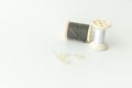 Close up of sewing items,Spool of thread, needle and button Royalty Free Stock Photo