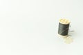 Close up of sewing items,Spool of thread, needle and button Royalty Free Stock Photo