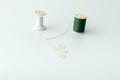 Close up of sewing items,Spool of thread, needle and button Royalty Free Stock Photo