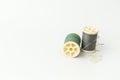 Close up of sewing items,Spool of thread, needle and button Royalty Free Stock Photo