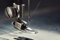 Close up of sewing machine needle with thread. Working part of old sewing machine Royalty Free Stock Photo