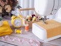 Sewing machine working with yellow fabric Royalty Free Stock Photo