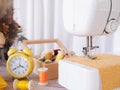 Sewing machine working with yellow fabric Royalty Free Stock Photo