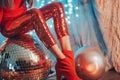 Close up of a sexy woman with a disco mirror ball. Nightclub and party background Royalty Free Stock Photo