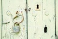 Painted wooden door with padlock and keyhole Royalty Free Stock Photo