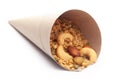 Close-Up of Shahi Mixture In handmade handcraft brown paper cone bag, made with peanut, cashew, almonds. Indian spicy snacks