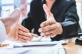 Close-up Shake hands lawyers in office. Counseling and Give an advice between private and government officials to find a fair