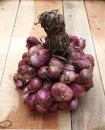 Close up shallots on wooden texture