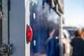 Close-up, shallow focus of a rear light seen attached to a horse trailer and box. Royalty Free Stock Photo