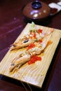 Close-up shallow focus shot of Japanese cuisine, cooked botan shrimp dish. Top with Tobiko(flying fish roe)