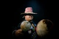 close up of Shaman man, sorcerer, during Pre-Hispanic ritual in Healing and cleaning with medicinal plants in Mexico, with black