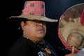 Close up of Shaman man, sorcerer, during Pre-Hispanic ritual in Healing and cleaning with medicinal plants in Mexico, with black