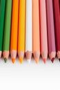 Close up of sharp colored pencils on a white background. Royalty Free Stock Photo