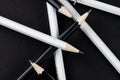 Ã Â¸ÂºBlack and white pencil on black background Royalty Free Stock Photo