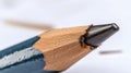 Close-up of a sharpened graphite pencil tip. Royalty Free Stock Photo
