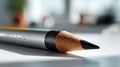 Close-up of a sharpened pencil on a smooth surface Royalty Free Stock Photo