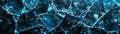 Close-up of shattered glass pieces in blue light, capturing abstract geometric patterns and textures Royalty Free Stock Photo