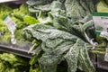 A close up of a shelf filled with kale at the vegan market in Atlanta Georgia