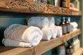 Close up of shelf with rolled bath towels at hotel spa Royalty Free Stock Photo