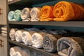 Close up of shelf with rolled bath towels at hotel spa Royalty Free Stock Photo
