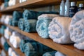 Close up of shelf with rolled bath towels at hotel spa Royalty Free Stock Photo