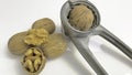 Shelled walnuts and nutcracker Royalty Free Stock Photo