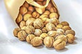 Shelled walnuts in a paper bag