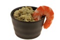 Ramekin of bearnaise sauce with a peeled prawn close-up on a white background Royalty Free Stock Photo