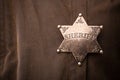 Close up of sheriff badge